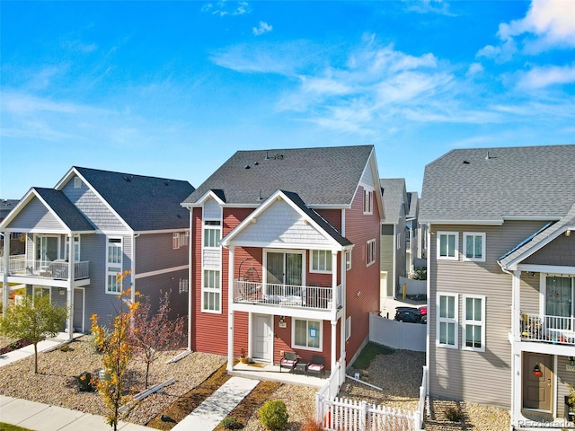 view of front of home with a balcony