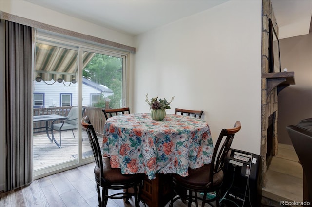 7840 S Windermere Cir, Littleton, CO 80120 - dining space with a fireplace