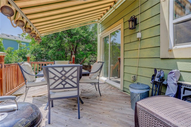 7840 S Windermere Cir, Littleton, CO 80120 - wooden deck featuring outdoor dining area