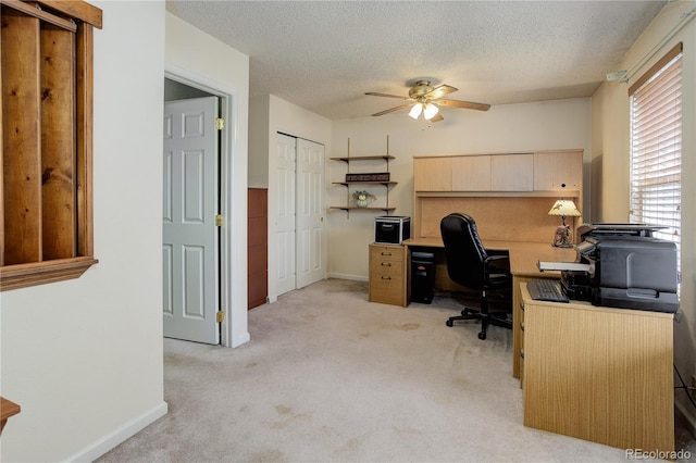 7840 S Windermere Cir, Littleton, CO 80120 - office area featuring a ceiling fan, light carpet, a textured ceiling, and baseboards