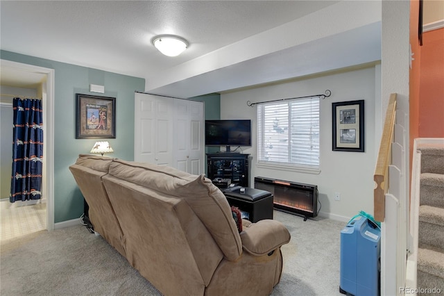 7840 S Windermere Cir, Littleton, CO 80120 - carpeted living room with baseboards, stairs, and a textured ceiling