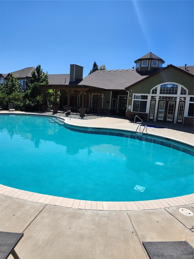 view of pool with a patio