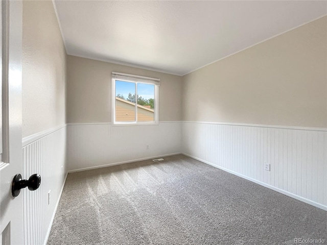 spare room with carpet floors