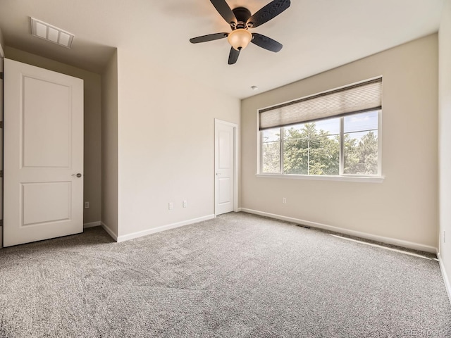 600 E Dry Creek Pl, Littleton, CO 80122 - unfurnished bedroom featuring carpet floors and a ceiling fan