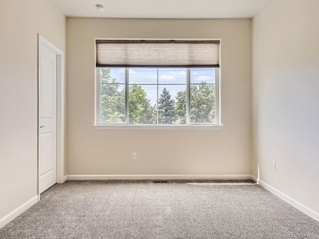 600 E Dry Creek Pl, Littleton, CO 80122 - unfurnished room with carpet flooring and a smoke detector