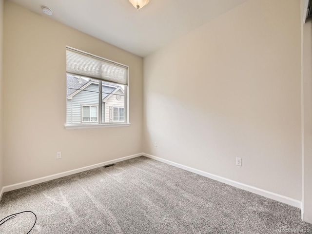 600 E Dry Creek Pl, Littleton, CO 80122 - unfurnished room featuring carpet floors and a smoke detector