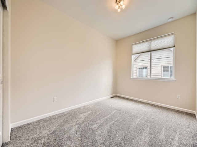 600 E Dry Creek Pl, Littleton, CO 80122 - carpeted empty room with baseboards
