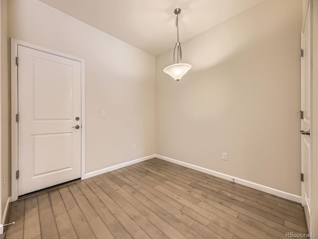 600 E Dry Creek Pl, Littleton, CO 80122 - empty room featuring baseboards and wood finished floors