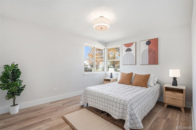 bedroom featuring light hardwood / wood-style flooring