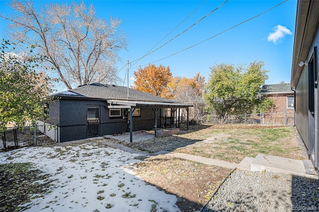 rear view of house with a patio area