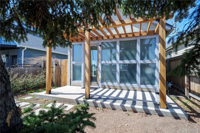 3735 Inca St, Denver, CO 80211 - rear view of house with a fenced backyard and a patio