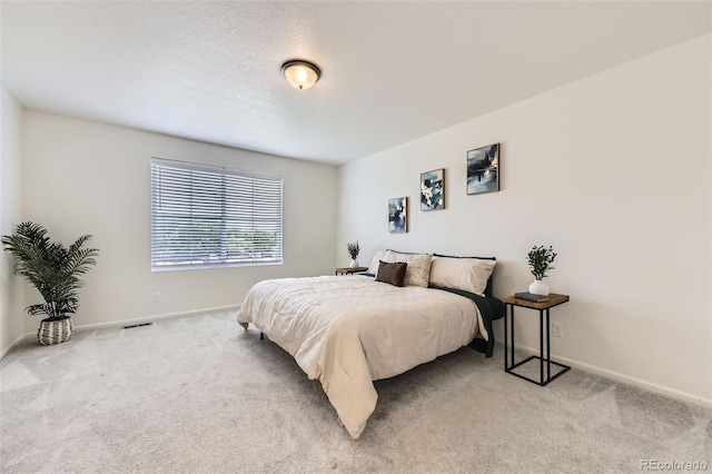 4433 N Picadilly Ct, Aurora, CO 80019 - bedroom featuring light carpet and baseboards