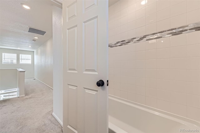 4433 N Picadilly Ct, Aurora, CO 80019 - full bathroom with shower / bath combination, recessed lighting, and baseboards