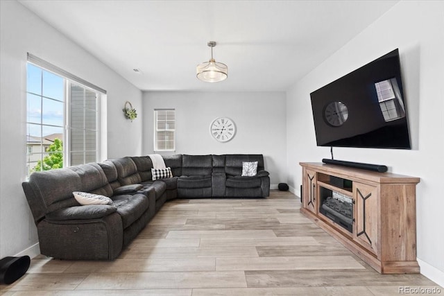 3344 Evening Pl, Castle Rock, CO 80109 - living room with light wood-type flooring and baseboards