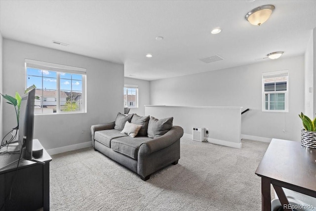 3344 Evening Pl, Castle Rock, CO 80109 - carpeted living area featuring baseboards and recessed lighting