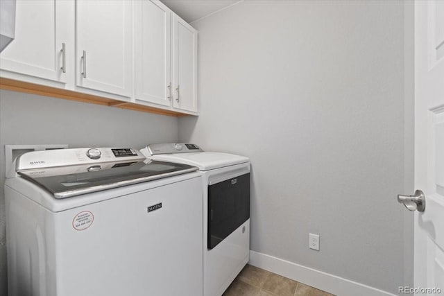 3344 Evening Pl, Castle Rock, CO 80109 - laundry room with washing machine and clothes dryer, cabinet space, and baseboards