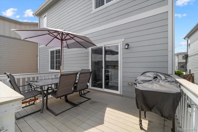 3344 Evening Pl, Castle Rock, CO 80109 - wooden deck featuring outdoor dining area