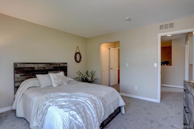 12812 Jasmine St Unit D, Thornton, CO 80602 - bedroom featuring light colored carpet