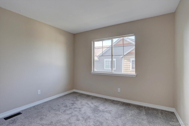 12812 Jasmine St Unit D, Thornton, CO 80602 - carpeted empty room with baseboards