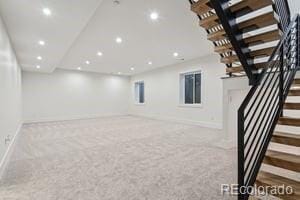 2620 N Perry St, Denver, CO 80212 - basement featuring carpet floors, recessed lighting, and stairway