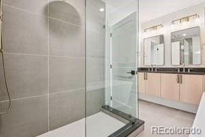 2620 N Perry St, Denver, CO 80212 - full bath featuring a shower stall and double vanity