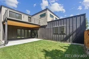 2620 N Perry St, Denver, CO 80212 - back of house with a patio