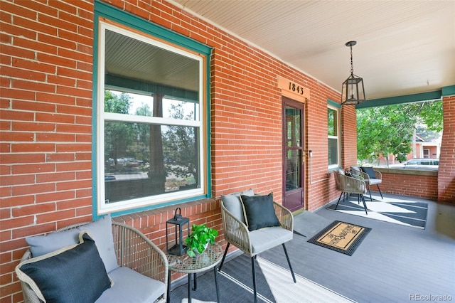 wooden deck featuring a porch