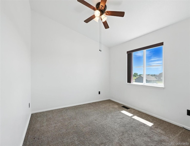 unfurnished room with carpet flooring, a ceiling fan, and lofted ceiling