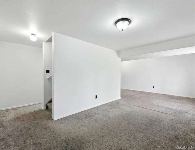 additional living space with carpet and stairs