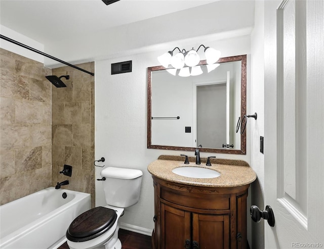 bathroom featuring vanity and tub / shower combination