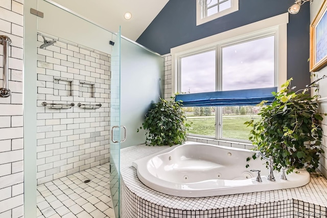 full bathroom with a whirlpool tub and a shower stall