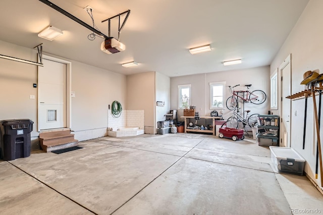 garage featuring a garage door opener