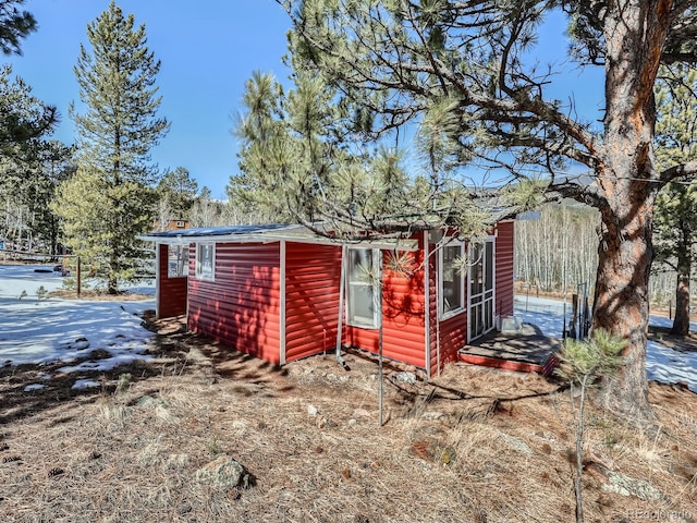 view of outbuilding with an outdoor structure