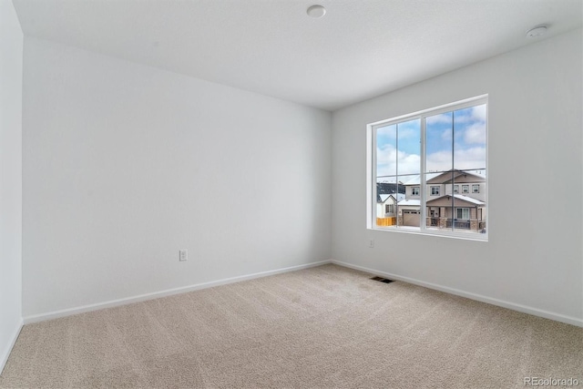 empty room with carpet floors