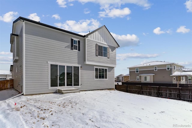 view of snow covered property