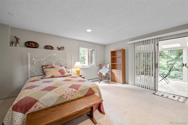 649 Cottonwood Dr, Evergreen, CO 80439 - carpeted bedroom with access to exterior, a textured ceiling, and recessed lighting