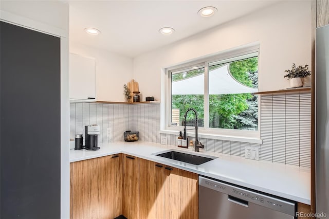 7491 W 45th Ave, Wheat Ridge, CO 80033 - kitchen with a sink, stainless steel dishwasher, modern cabinets, backsplash, and recessed lighting