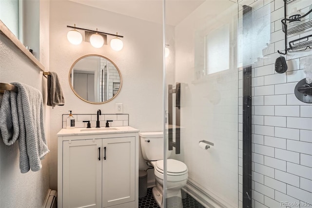 7491 W 45th Ave, Wheat Ridge, CO 80033 - full bath featuring a stall shower, toilet, and vanity