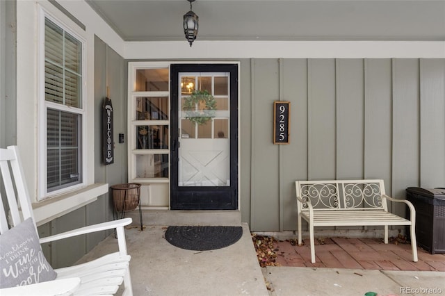 property entrance with board and batten siding