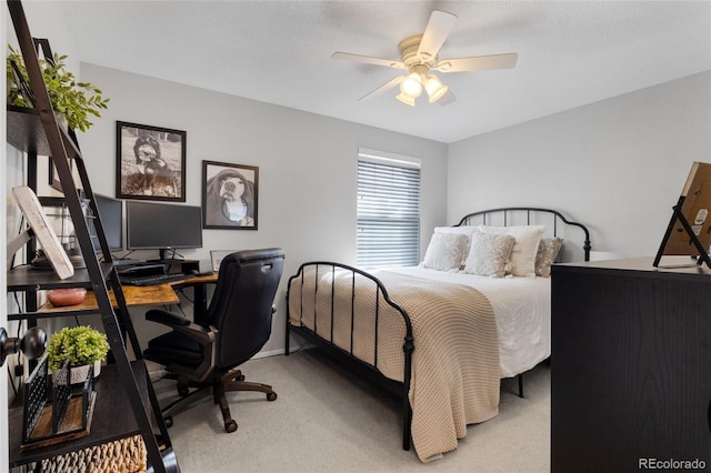 bedroom with light carpet and ceiling fan