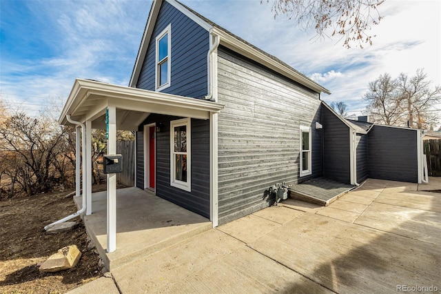 view of home's exterior with a patio area