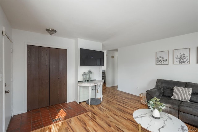 living room featuring dark hardwood / wood-style floors