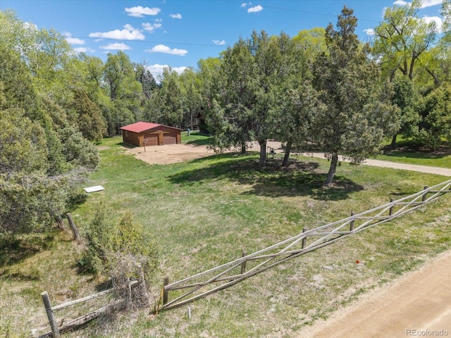 1638 County Road 46, Howard, CO 81233 - view of yard with an outdoor structure and a garage