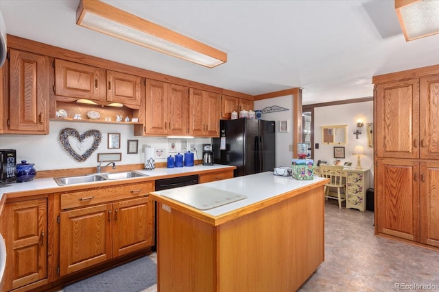 1638 County Road 46, Howard, CO 81233 - kitchen with black appliances, a sink, light countertops, and brown cabinetry