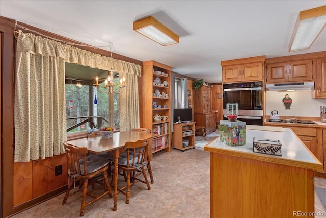 1638 County Road 46, Howard, CO 81233 - dining area featuring a chandelier and light floors