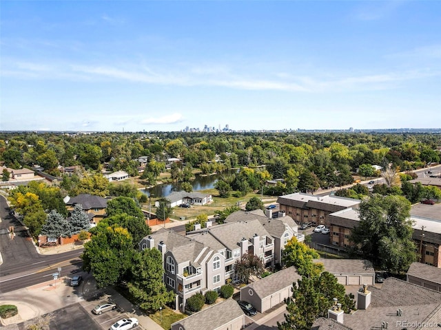 birds eye view of property featuring a water view and a residential view