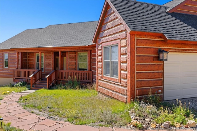 114 Round Hill Rd, Fairplay, CO 80440 - view of front of home with roof with shingles and a porch