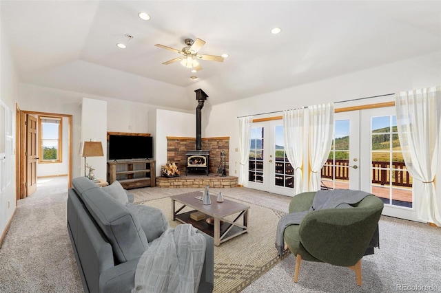 114 Round Hill Rd, Fairplay, CO 80440 - living area featuring french doors, light colored carpet, plenty of natural light, a wood stove, and recessed lighting