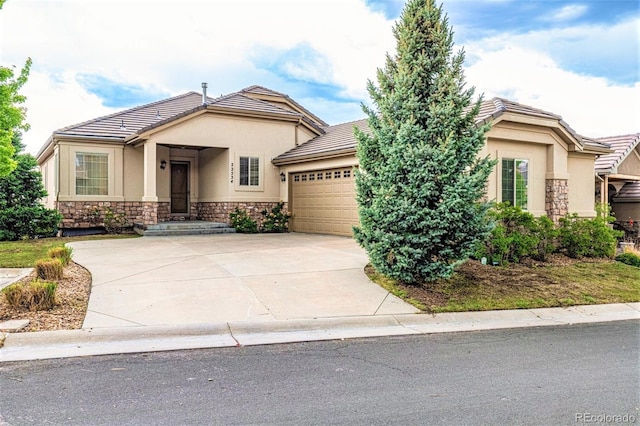 view of front of property featuring a garage