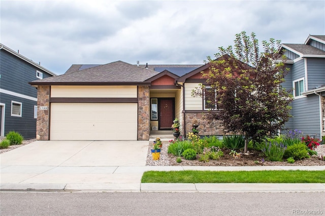 1766 Country Sun Dr, Windsor, CO 80550 - view of front of house with stone siding, an attached garage, driveway, and a shingled roof